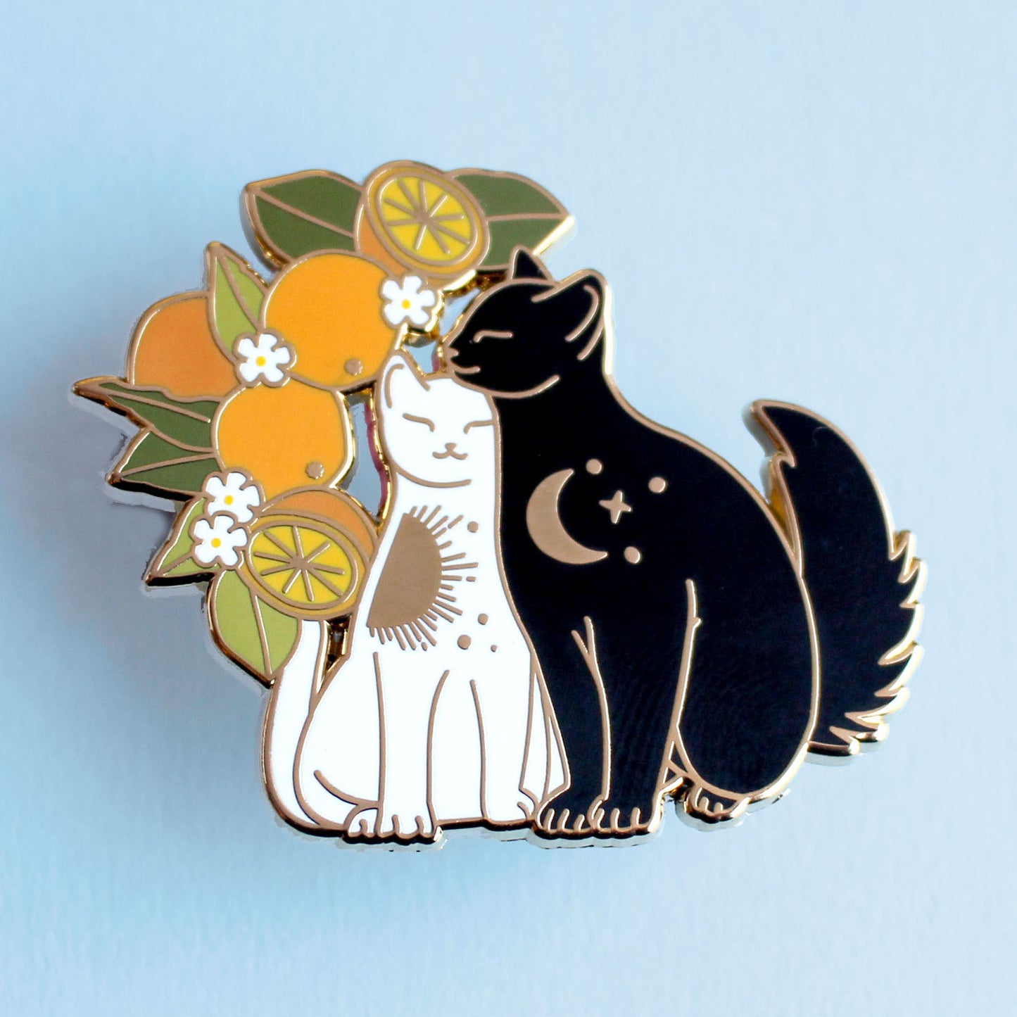 Snuggling cats enamel pin with oranges