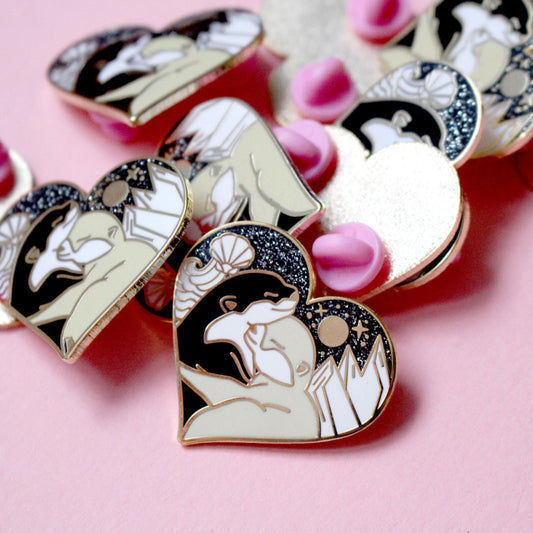 Land & sea hugging otters pin
