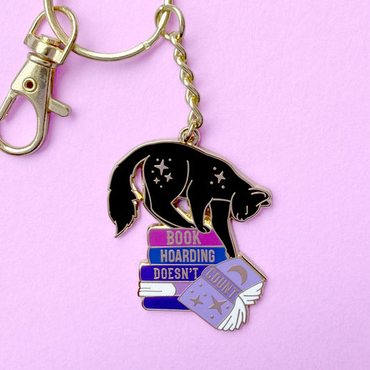 Book Hoarding Doesn't Count keychain