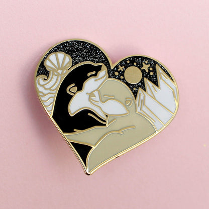 Land & sea hugging otters pin