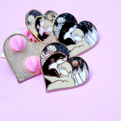 Land & sea hugging otters pin